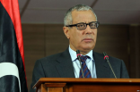 رئيس وزراء ليبيا يقول إن الليبيين يجب أن يحاكموا في بلادهم